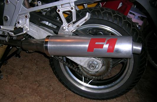 [The rear half of the bike with the exhaust reinstalled from the swingarm removal.]