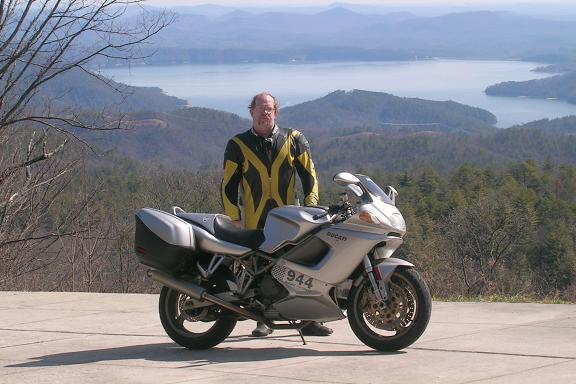 [Here I am posing with the ST2 with Lake Jocassee in the background.]