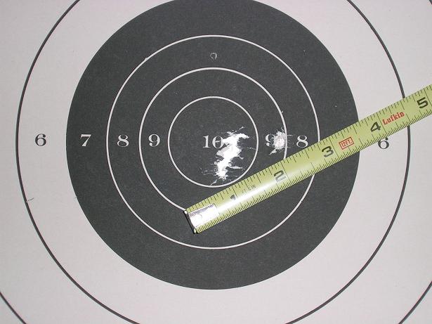 [Checking the accuracy and reliability of a Colt Officer ACP.]