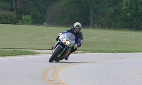 [I'm riding the GSXR near the subdivision.]