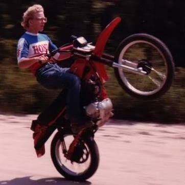 [Riding a wheelie at 14 on the '80 Honda XR200.]